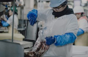 woman working with beef 